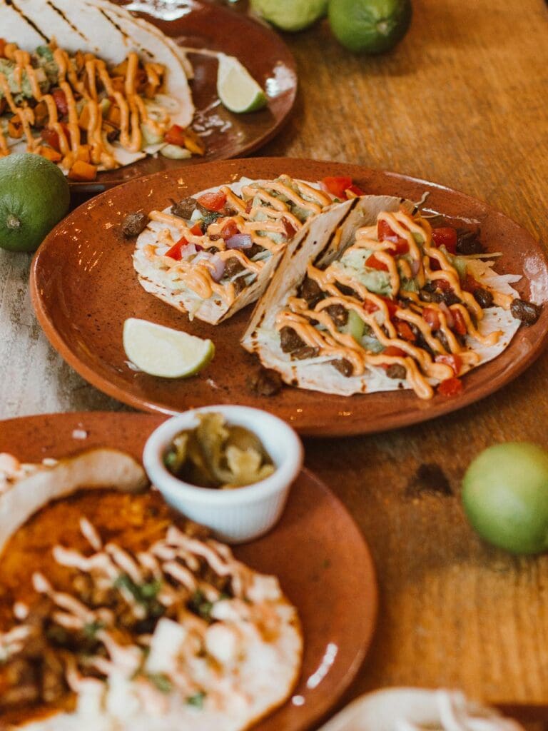 Close-up of tacos served at a mexican restaurant reno showcasing fresh ingredients and traditional presentation on a warm plate.